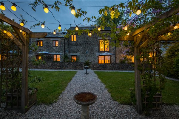 Exterior of the Threshing Barn with festoon lights